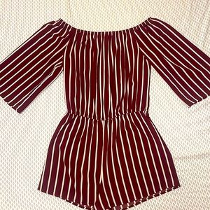 Burgundy and white off sleeve romper with a beachy flair